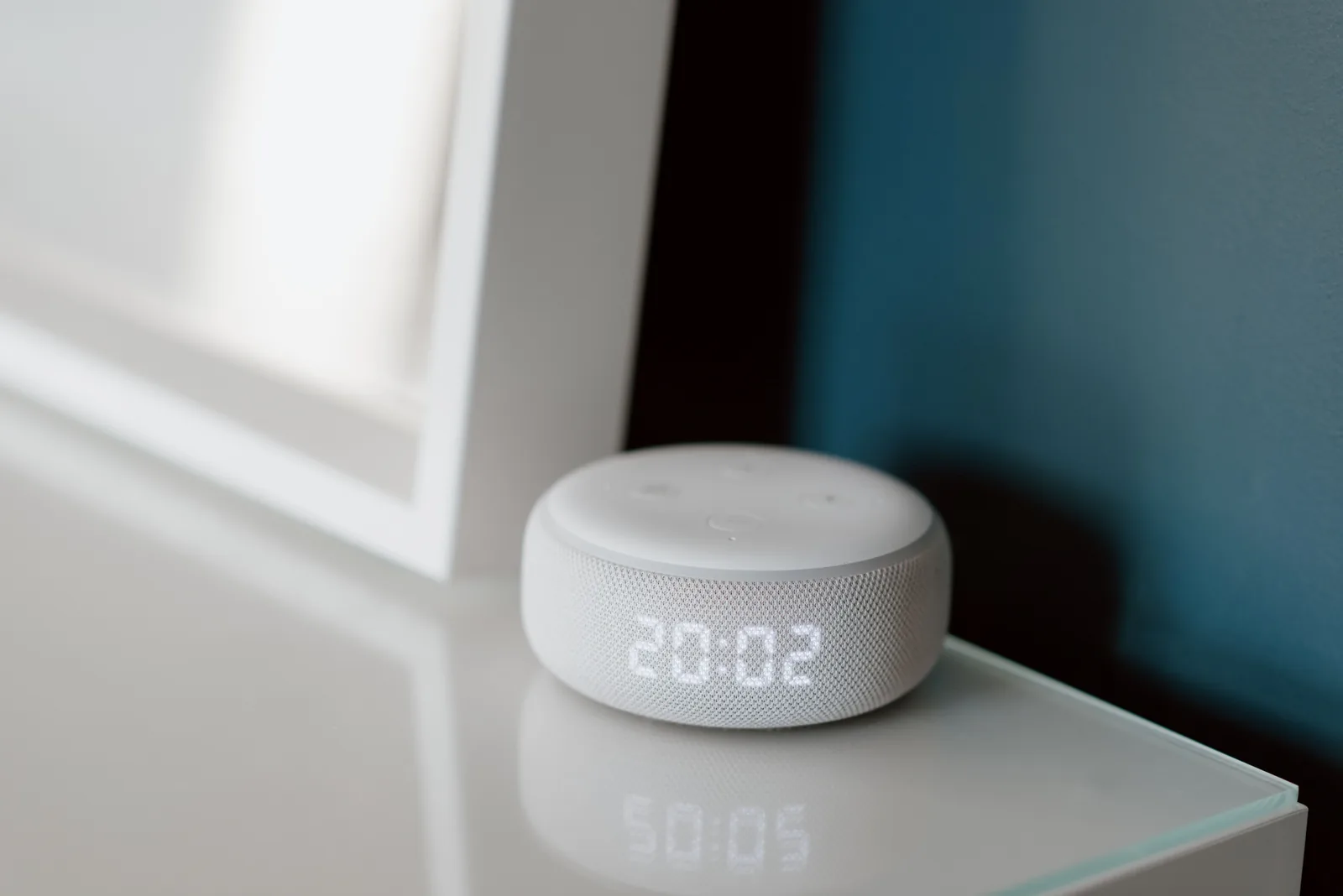 Smart speaker with a clock display