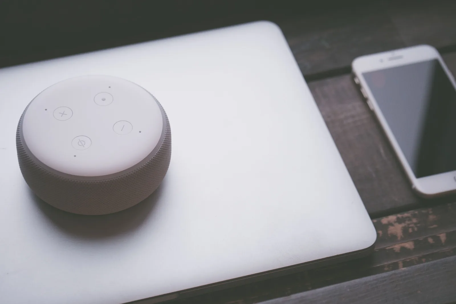 Phone beside a smart speaker