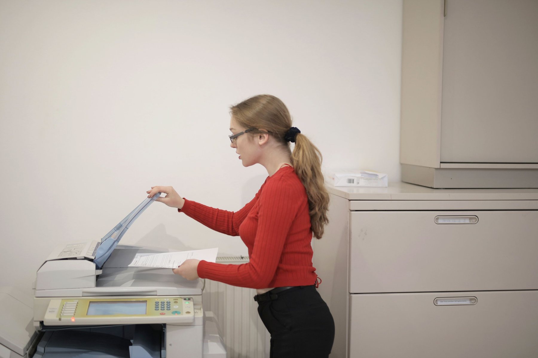 Office worker using a copier